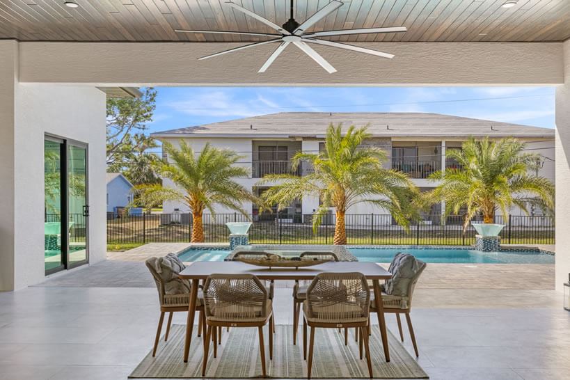 summer dining set outdoors under a ceiling fan